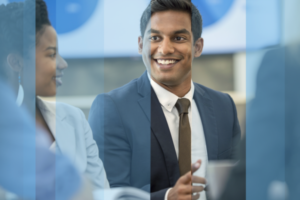 Businessman smiling in meeting