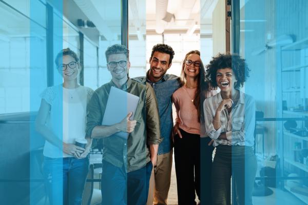 Happy Team Casual business professionals laugh together