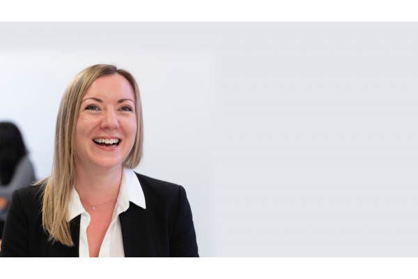 Laughing business professional woman